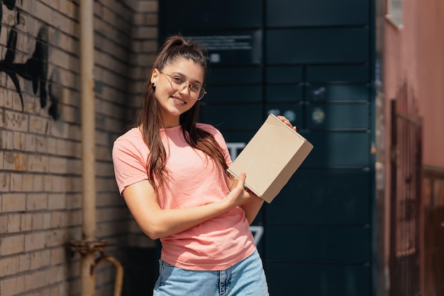 woman preparing parcel shipment client near post office 688382 219